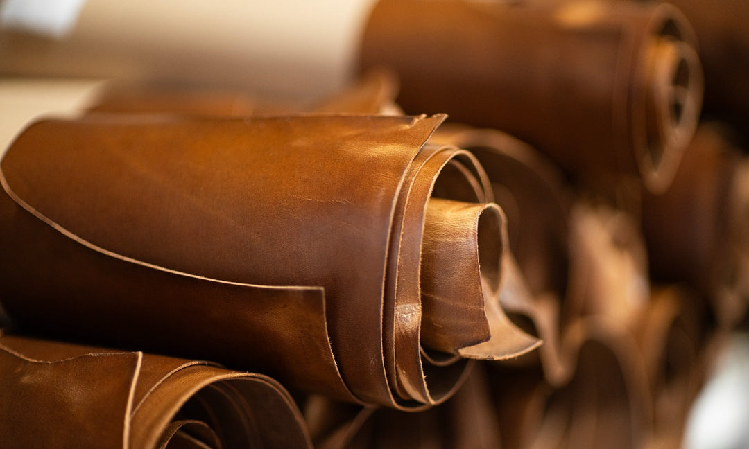 rolls of glossy tan leather
