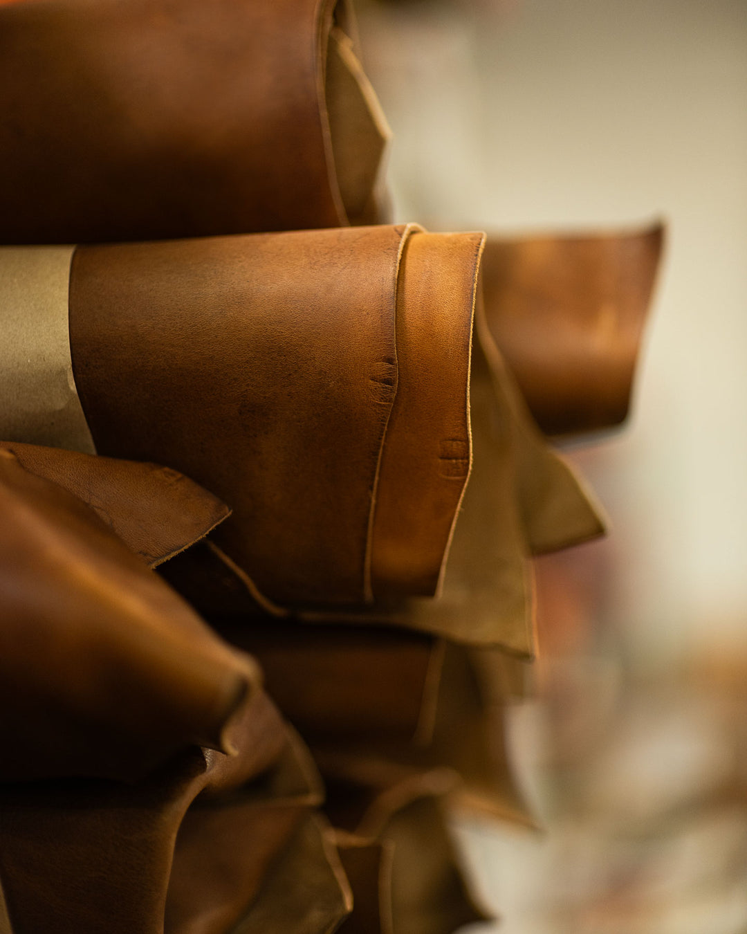 close up of british tan grizzly leather rolls