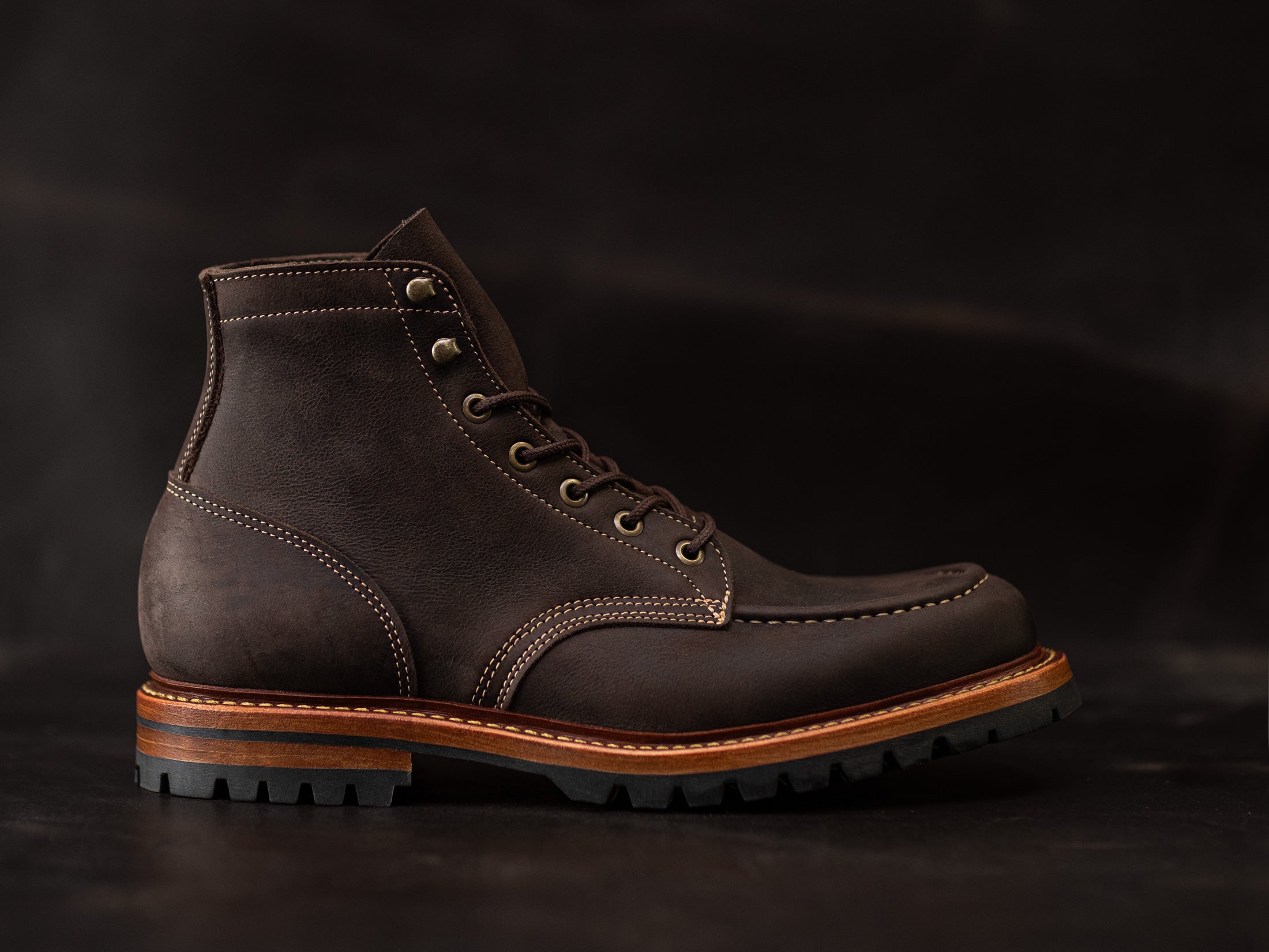 side view of brown kudu leather boot on brown kudu leather background