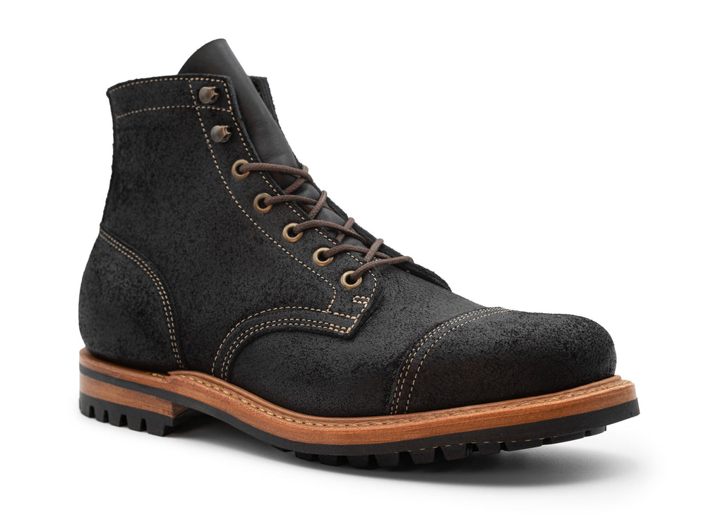 black leather boot on a white background 3QTR view
