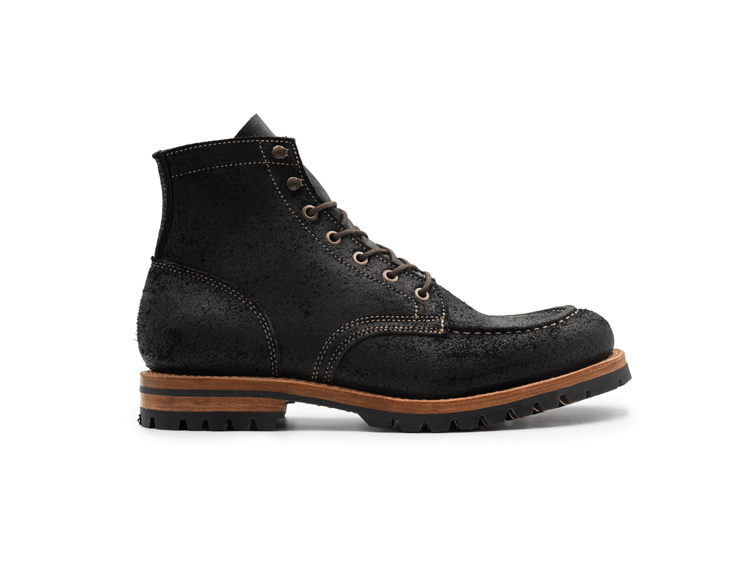 animated rotating 360° view of black moc toe boots on white background