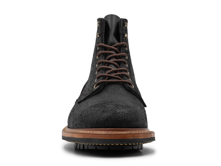 front view of black rough out boot on white background