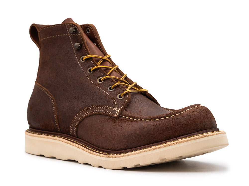 3qtr view of brown oiled rough out leather moc toe boot on white background