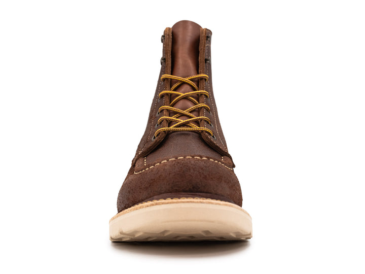 front view of brown oiled rough out leather moc toe boot on white background