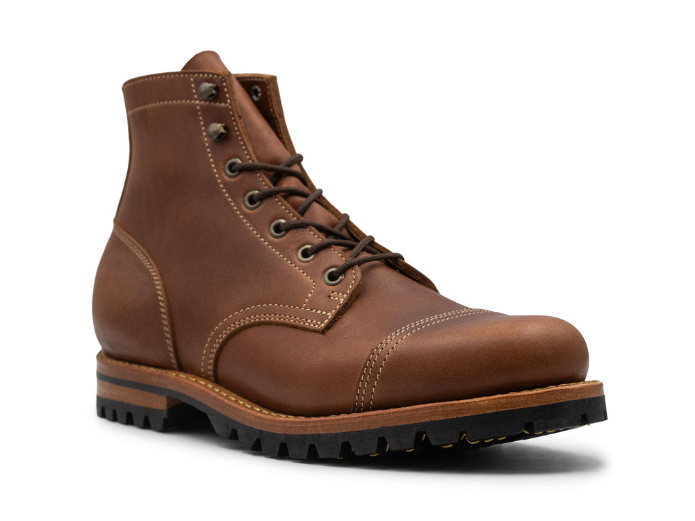 Brown leather boot on a white background 3QTR view