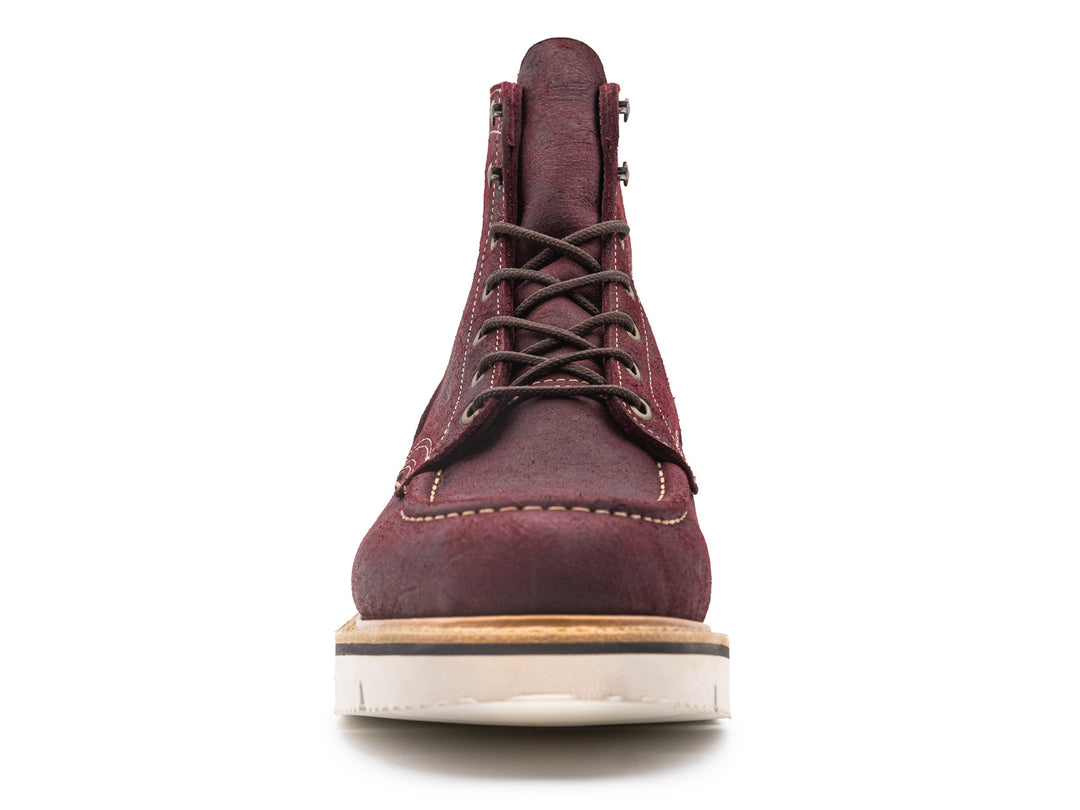 front view of burgundy rambler leather moc toe boot on white background
