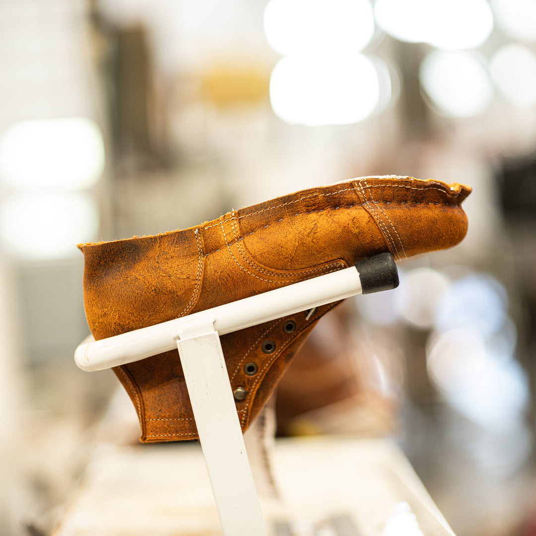 coach rambler boots on white rack waiting to be heel lasted