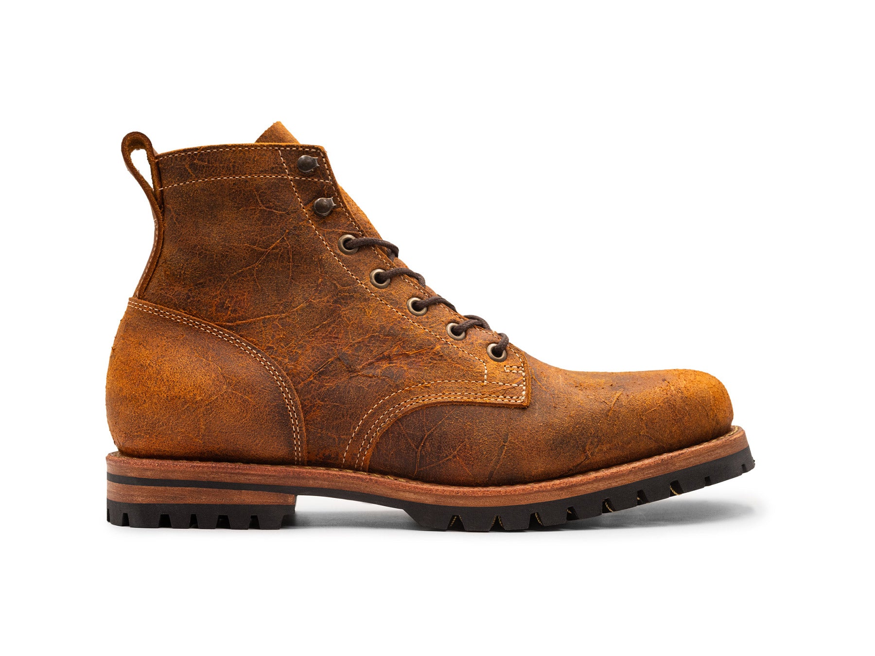 coach rambler leather boot side view on white background