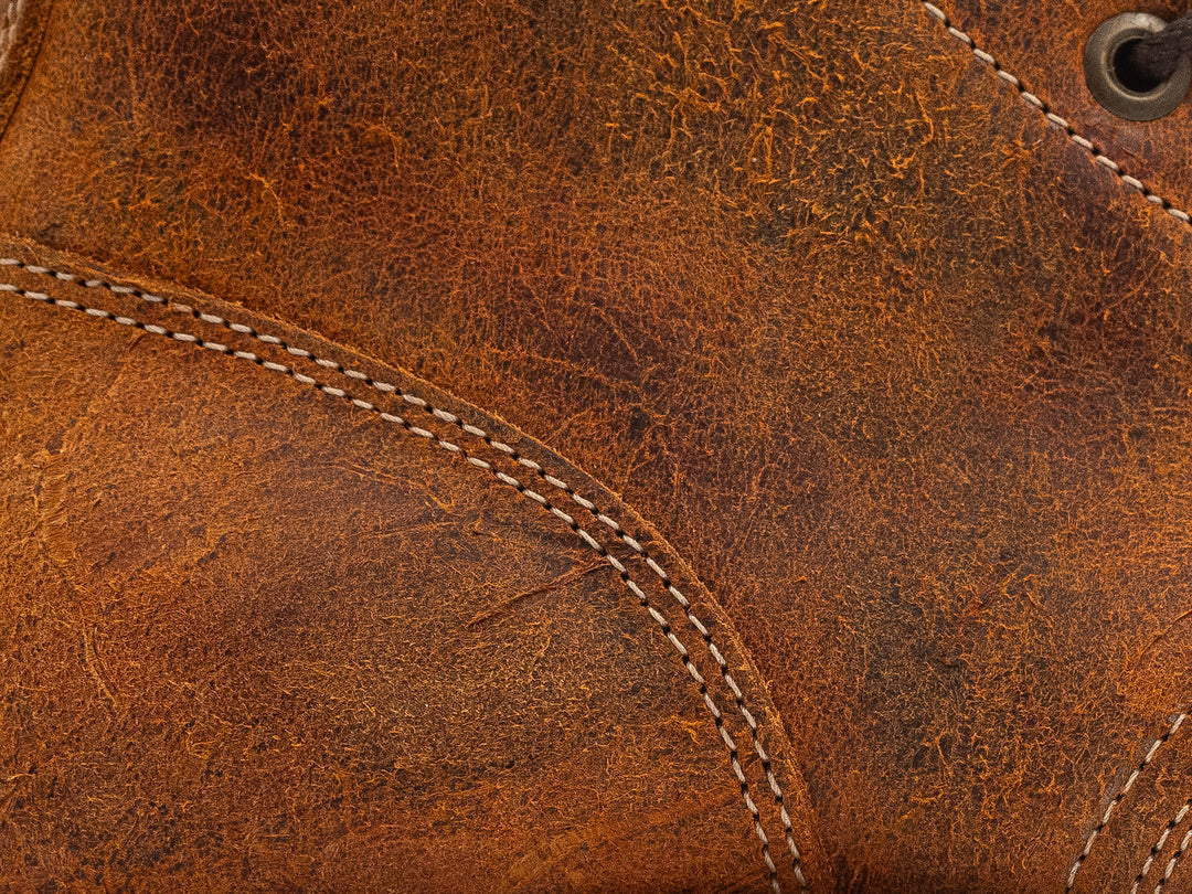 close up shot of coach rambler leather