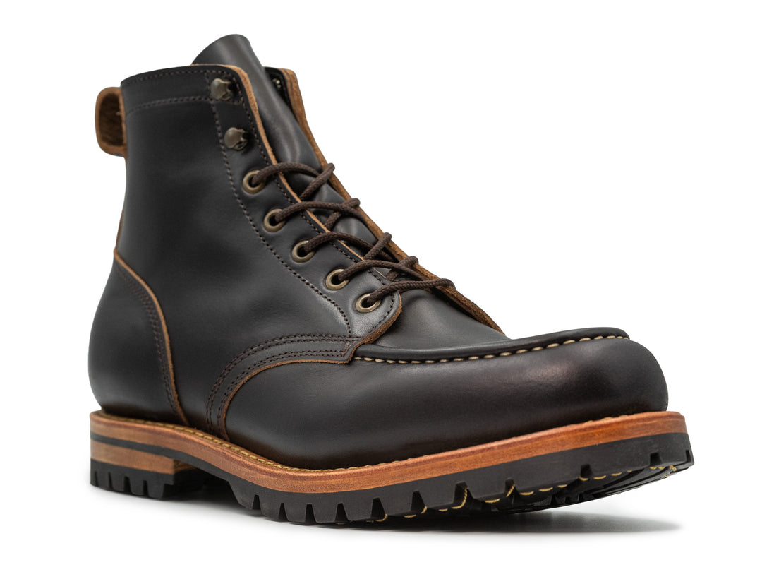3QTR  view of black moc toe boot on white background