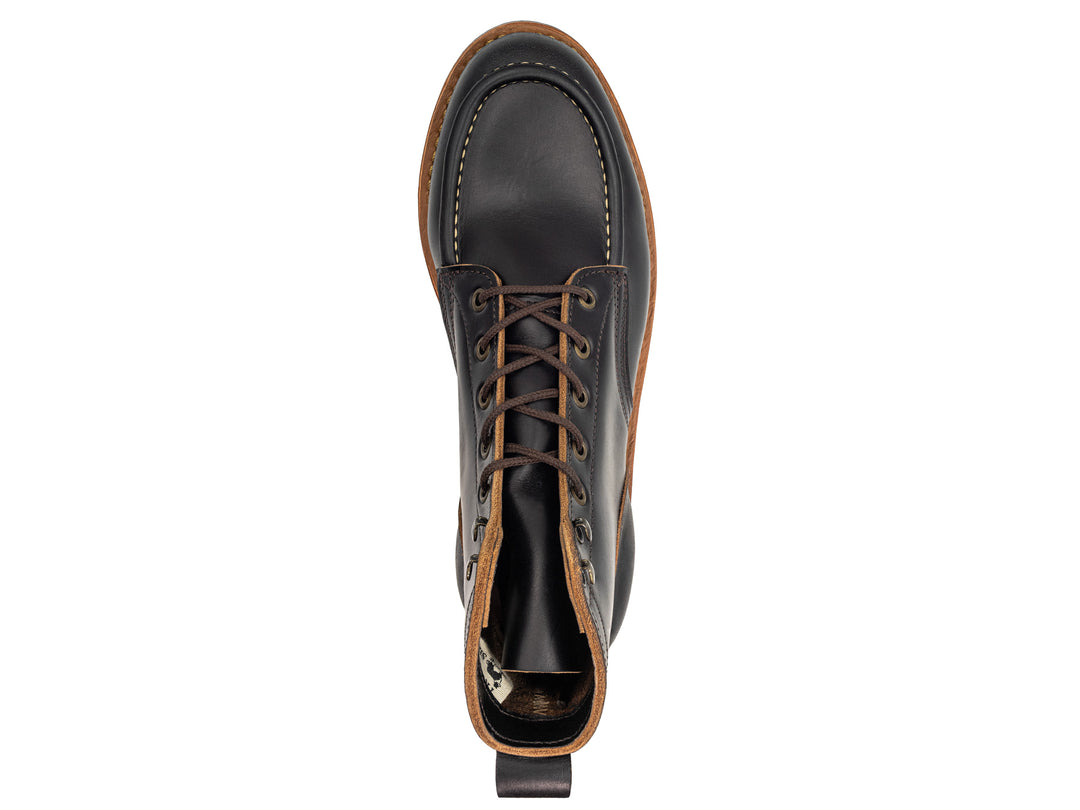 topdown view of black moc toe boot on white background