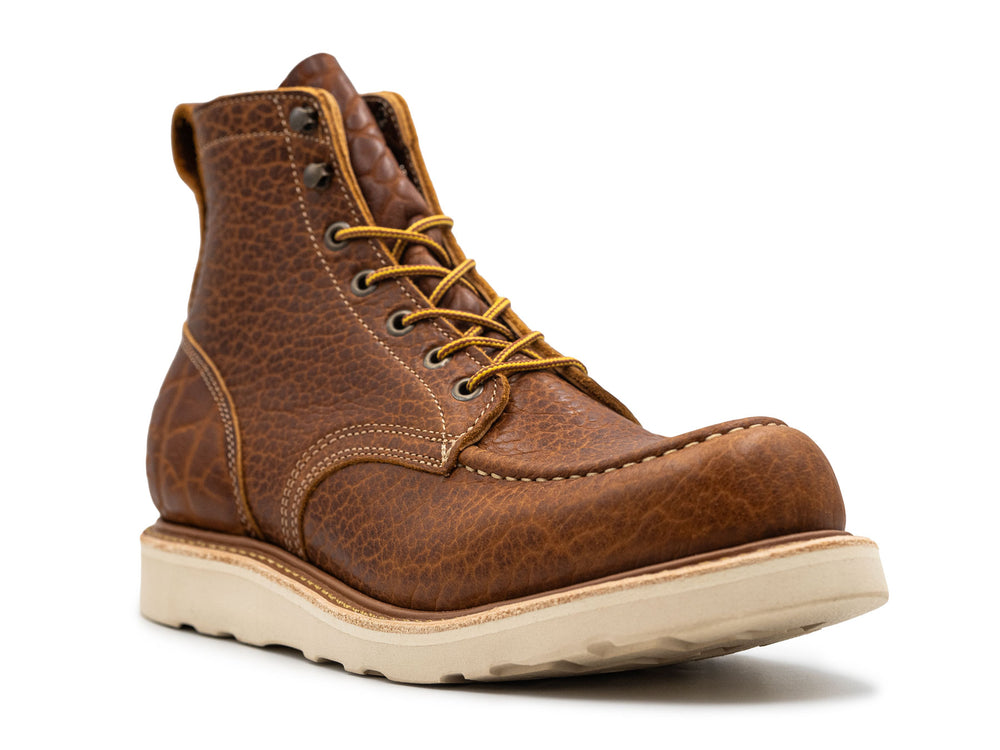 3qtr view of cognac shrunken bison moc toe boot on white background