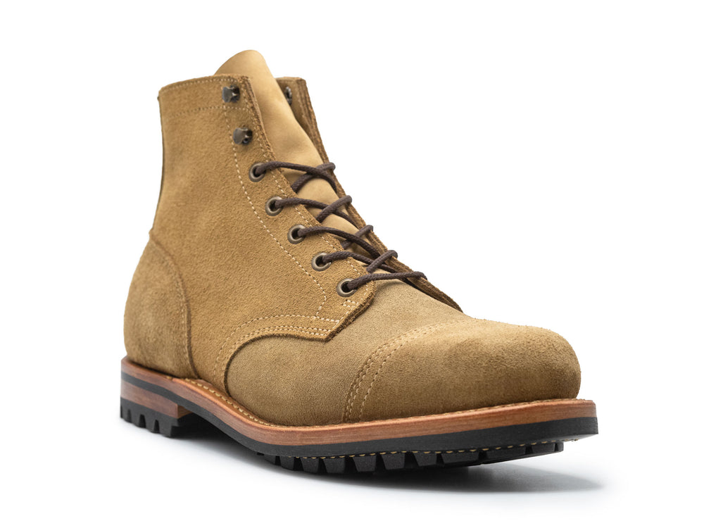 tan leather boot on a white background 3QTR view
