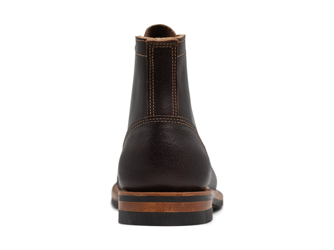 back view of java waxed leather boot on white background