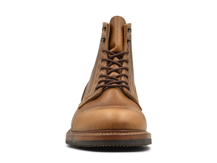 front view of sesame double shot leather boot on white background