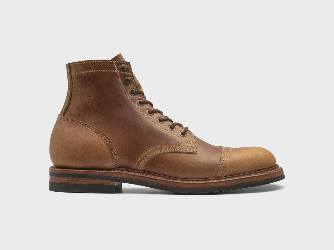rotating 360° view of sesame double shot leather boot on white background
